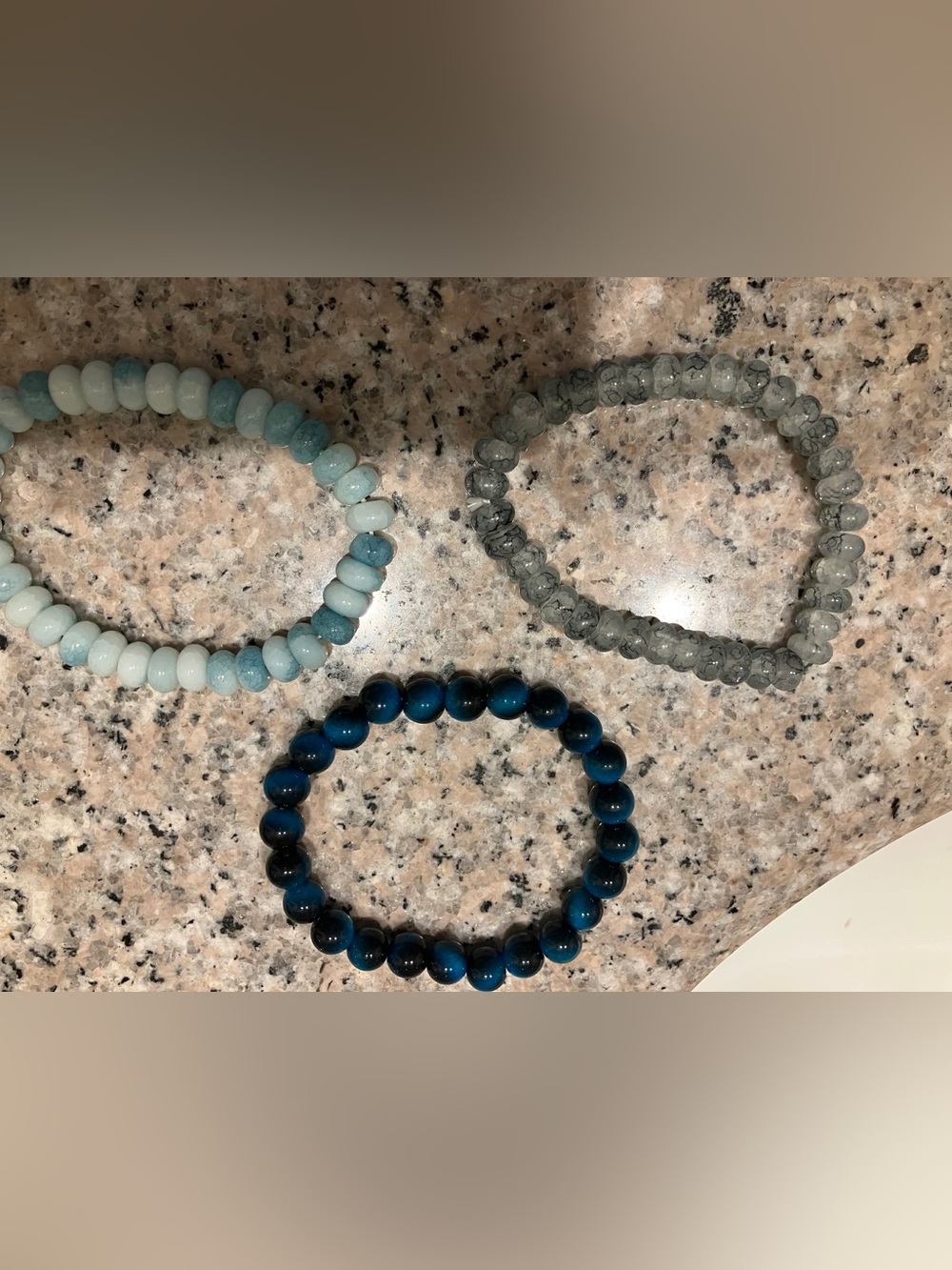 3 blue beaded bracelets